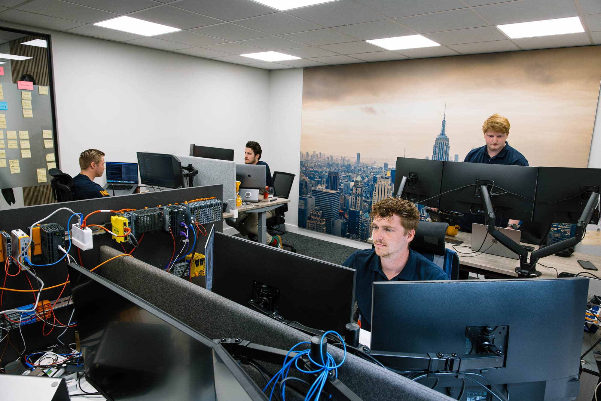 GCG engineers working with software and a B&R PLC setup at the Volendam office