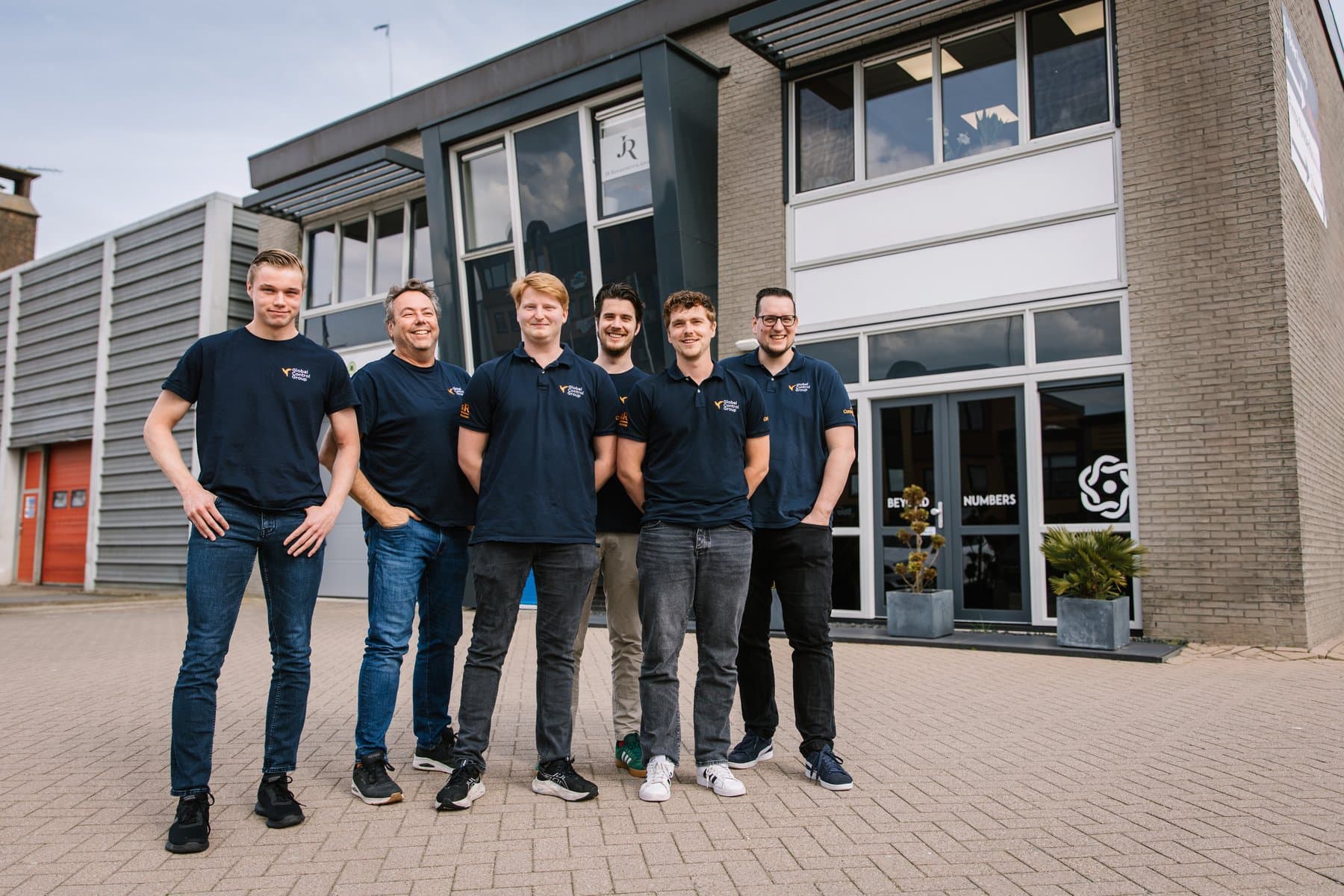 The complete GCG team outside the Volendam office